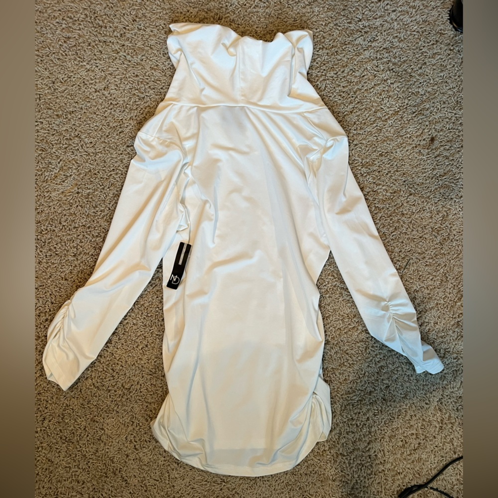 Woman’s New Directions white turtleneck top. New